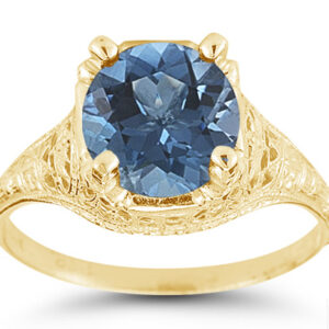 Antique-Style from the 1800s Floral Blue Topaz Ring in 14K Yellow Gold